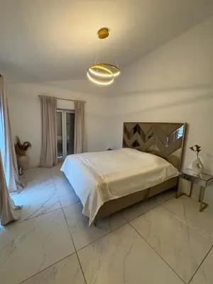Ein Bett oder Betten in einem Zimmer der Unterkunft DHHEsting