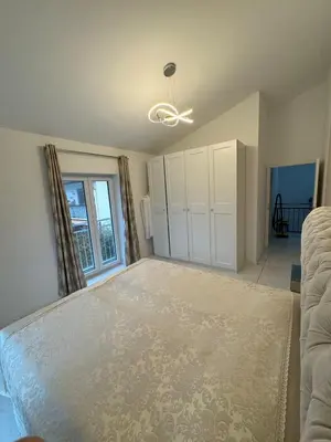 Ein Bett oder Betten in einem Zimmer der Unterkunft DHHEsting