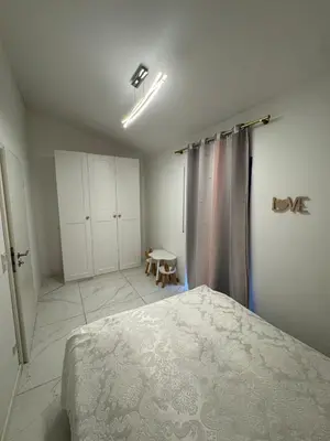 Ein Bett oder Betten in einem Zimmer der Unterkunft DHHEsting
