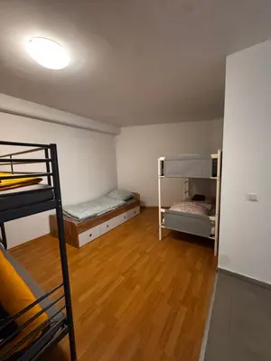 Ein Bett oder Betten in einem Zimmer der Unterkunft Stadt Wohnung 1