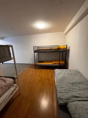 Ein Bett oder Betten in einem Zimmer der Unterkunft Stadt Wohnung 1