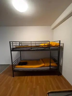 Ein Bett oder Betten in einem Zimmer der Unterkunft Stadt Wohnung 1