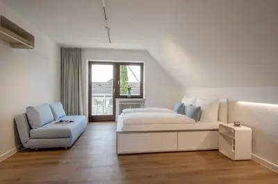 Ein Sitzbereich in der Unterkunft Neueröffnung Haus zum Wald
