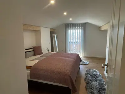 Ein Bett oder Betten in einem Zimmer der Unterkunft Charmantes Dorf-Apartment