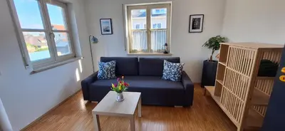 Ein Sitzbereich in der Unterkunft Schweizer's Ferienwohnung