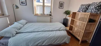 Ein Bett oder Betten in einem Zimmer der Unterkunft Schweizer's Ferienwohnung