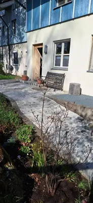 Ein Garten an der Unterkunft Schweizer's Ferienwohnung