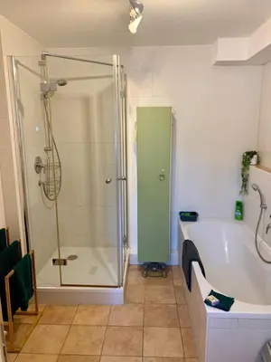 Ein Badezimmer in der Unterkunft Sunny 100 sqm family apartment with alpine views