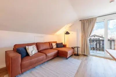 Ein Sitzbereich in der Unterkunft Bergpanorama
