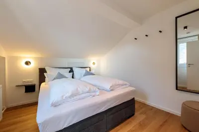 Ein Bett oder Betten in einem Zimmer der Unterkunft Bergpanorama