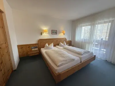 Ein Bett oder Betten in einem Zimmer der Unterkunft Aparthotel Terrassenhof