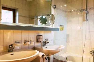 Ein Badezimmer in der Unterkunft Aparthotel Terrassenhof
