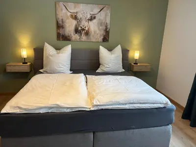 Ein Bett oder Betten in einem Zimmer der Unterkunft SeeZeit 85qm EG Barrierefrei