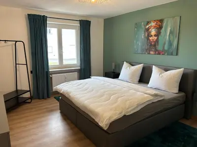 Ein Bett oder Betten in einem Zimmer der Unterkunft SeeZeit 85qm EG Barrierefrei