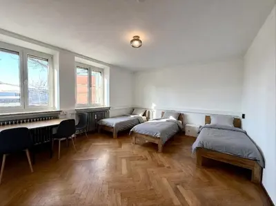 Ein Bett oder Betten in einem Zimmer der Unterkunft Wohnung mit mehreren Zimmern im Schlachthofquartier - Ideal für Monteure