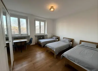 Ein Bett oder Betten in einem Zimmer der Unterkunft Wohnung mit mehreren Zimmern im Schlachthofquartier - Ideal für Monteure