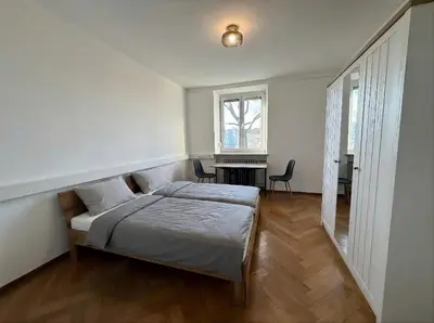 Ein Bett oder Betten in einem Zimmer der Unterkunft Wohnung mit mehreren Zimmern im Schlachthofquartier - Ideal für Monteure