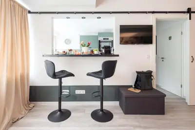 TV/Unterhaltungsangebot in der Unterkunft modernes Apartment fussläufig zum Schlosspark Nymphenburg mit guten Verkehrsanbindungen ideal für Business City-Trips und Events