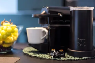 Kaffee-/Teezubehör in der Unterkunft modernes Apartment fussläufig zum Schlosspark Nymphenburg mit guten Verkehrsanbindungen ideal für Business City-Trips und Events