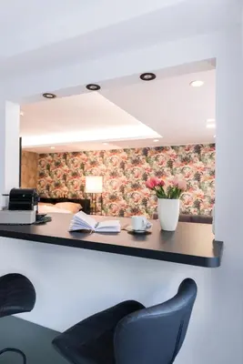 Ein Sitzbereich in der Unterkunft modernes Apartment fussläufig zum Schlosspark Nymphenburg mit guten Verkehrsanbindungen ideal für Business City-Trips und Events