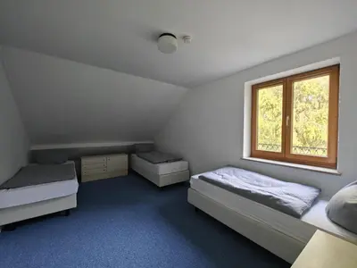 Ein Bett oder Betten in einem Zimmer der Unterkunft Apartments München-Pasing