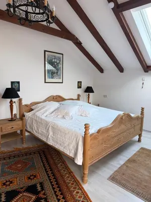 Ein Bett oder Betten in einem Zimmer der Unterkunft Landhaus in oberbayerischen Voralpen