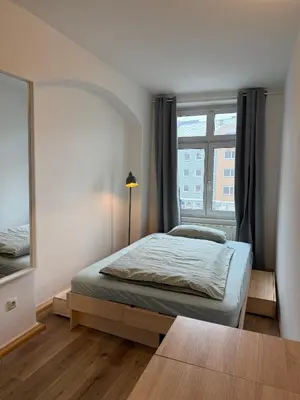 Ein Bett oder Betten in einem Zimmer der Unterkunft Wohnung für Monteure und Geschäftsreisende - Jakobervorstadt