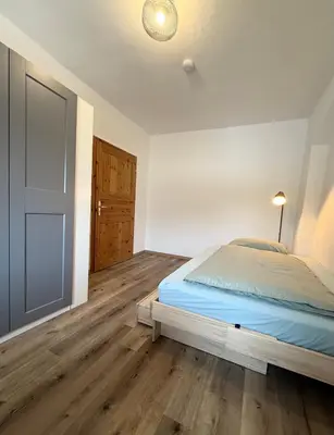 Ein Bett oder Betten in einem Zimmer der Unterkunft Wohnung für Monteure und Geschäftsreisende - Jakobervorstadt