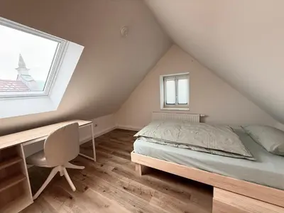 Ein Bett oder Betten in einem Zimmer der Unterkunft Wohnung für Monteure und Geschäftsreisende - Jakobervorstadt
