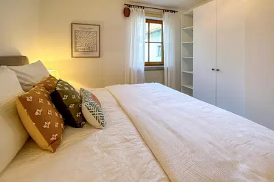 Ein Bett oder Betten in einem Zimmer der Unterkunft Chiemsee Flair