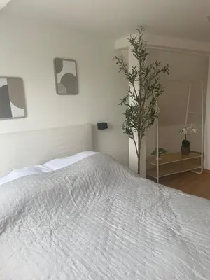 Ein Bett oder Betten in einem Zimmer der Unterkunft Sky Loft 3-room duplex apartment