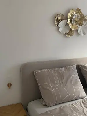Ein Bett oder Betten in einem Zimmer der Unterkunft Modern & cozy 4-room apartment with charm
