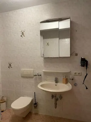Ein Badezimmer in der Unterkunft Modern & cozy 4-room apartment with charm