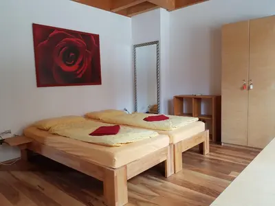 Ein Bett oder Betten in einem Zimmer der Unterkunft Der Staudenhof