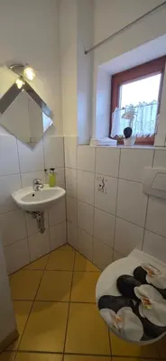 Ein Badezimmer in der Unterkunft Ferienwohnung Lichtblick Oberbayern, sonnig, Bergblick, großer Balkon