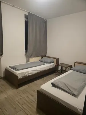 Ein Bett oder Betten in einem Zimmer der Unterkunft Hanin 4