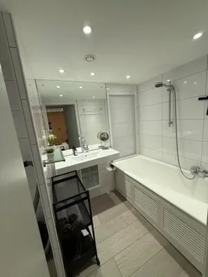 Ein Badezimmer in der Unterkunft Moderne FeWo - Studio16 mit Bergblick