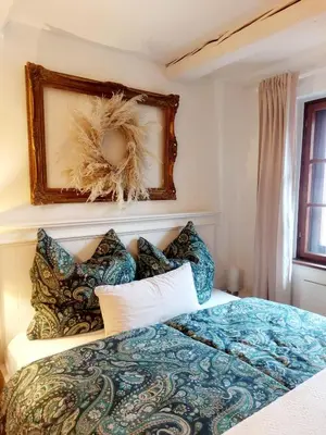 Ein Bett oder Betten in einem Zimmer der Unterkunft 50qm Appartement Rosenheim Innenstadt