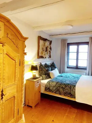 Ein Bett oder Betten in einem Zimmer der Unterkunft 50qm Appartement Rosenheim Innenstadt