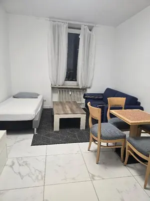 Ein Bett oder Betten in einem Zimmer der Unterkunft Hanin 9