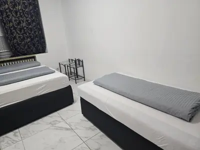 Ein Bett oder Betten in einem Zimmer der Unterkunft Hanin 9