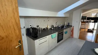 Küche/Küchenzeile in der Unterkunft Apartment am Chiemsee nähe Chieming Arlaching Ising Seebruck