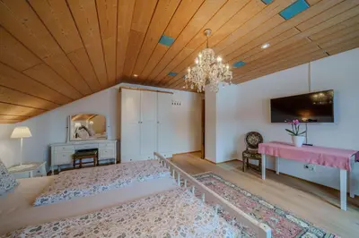 Ein Bett oder Betten in einem Zimmer der Unterkunft Adlerhorst