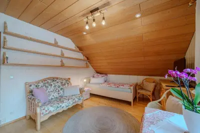 Ein Bett oder Betten in einem Zimmer der Unterkunft Adlerhorst