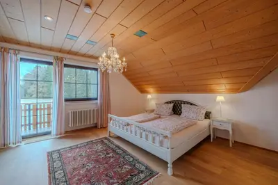 Ein Bett oder Betten in einem Zimmer der Unterkunft Adlerhorst