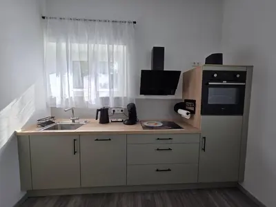 Küche/Küchenzeile in der Unterkunft Modernes zentrales Hideaway in der alten Post