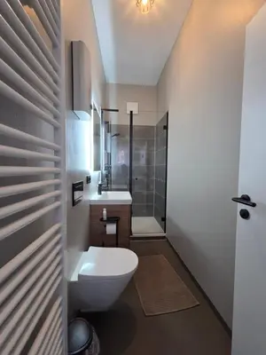 Ein Badezimmer in der Unterkunft Modernes zentrales Hideaway in der alten Post