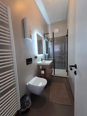 Ein Badezimmer in der Unterkunft Modernes zentrales Hideaway in der alten Post