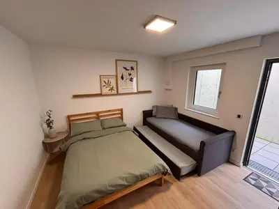 Ein Bett oder Betten in einem Zimmer der Unterkunft Modern studio