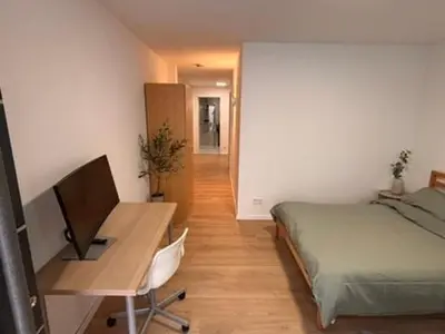 Ein Bett oder Betten in einem Zimmer der Unterkunft Modern studio